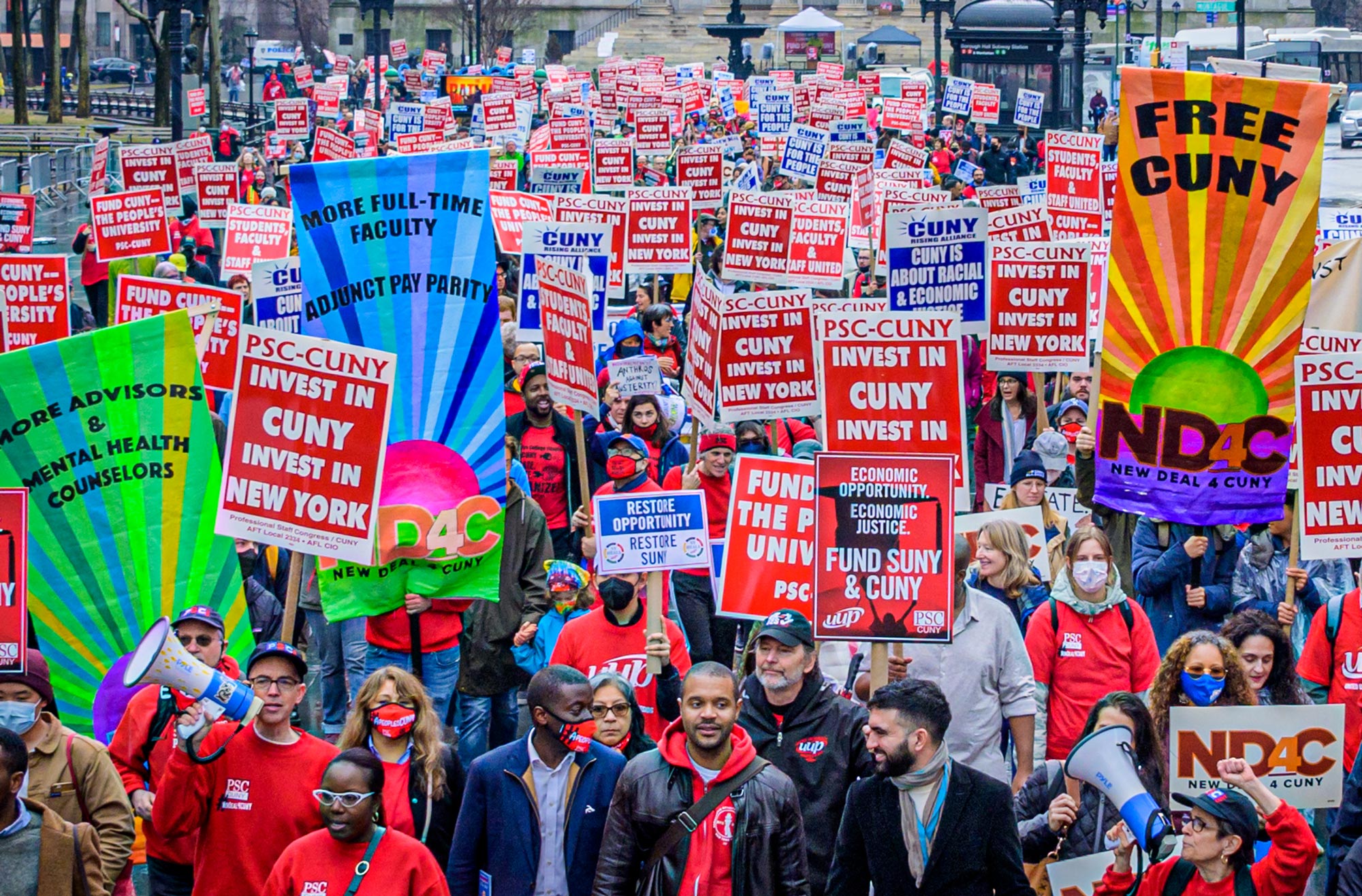 In March, PSC and CUNY Rising join forces with the United University Professions (the SUNY faculty and staff union) to lead hundreds across the Brooklyn Bridge to demand full funding for public higher education. (Credit: Erik McGregor)