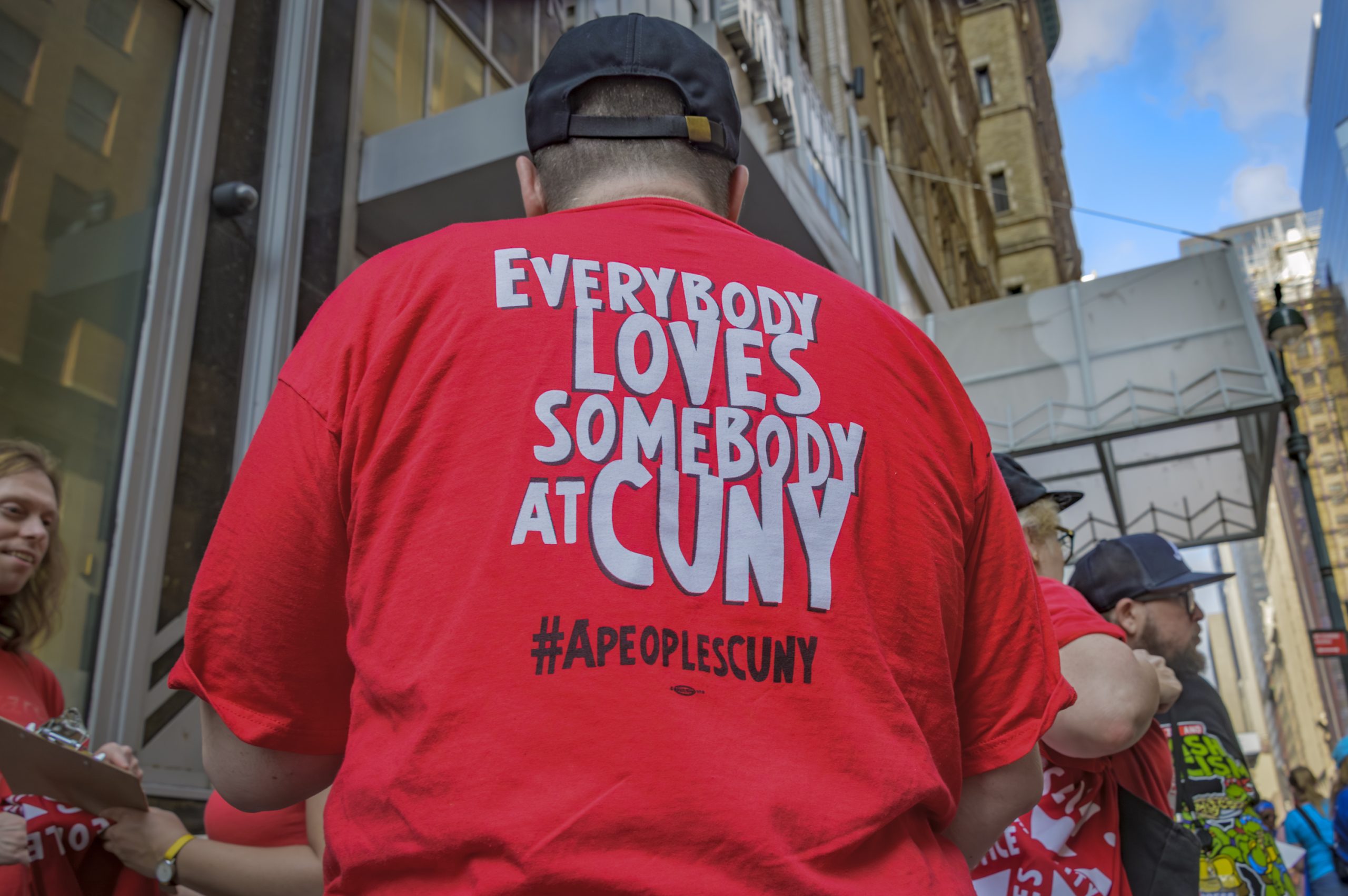 PSC member wears shirt that reads: "Everybody Loves Somebody at CUNY" at the 2023 NYC Labor Day Parade in Manhattan.  (Photo by Erik McGregor)