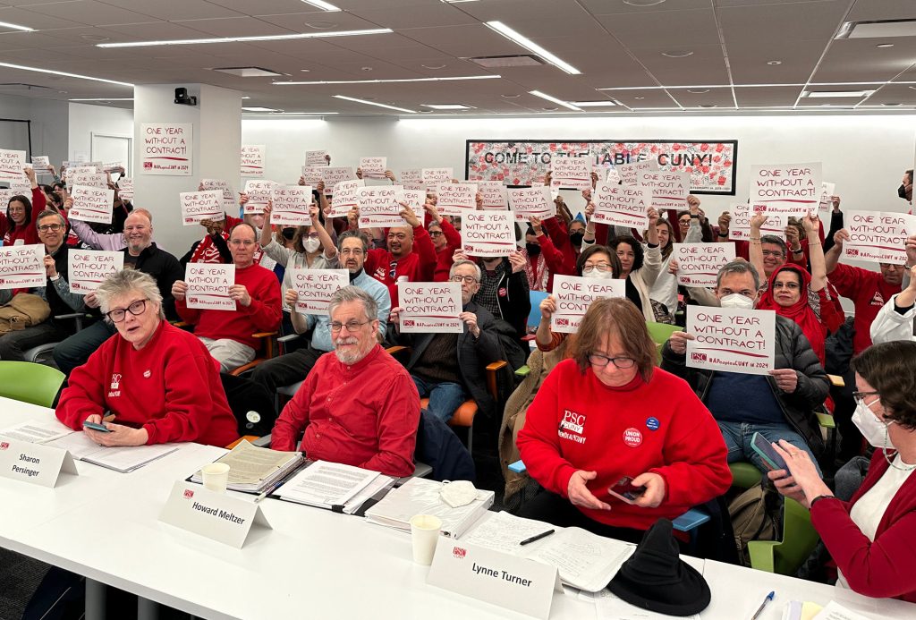 Members show solidarity during a bargaining session with CUNY administration. 