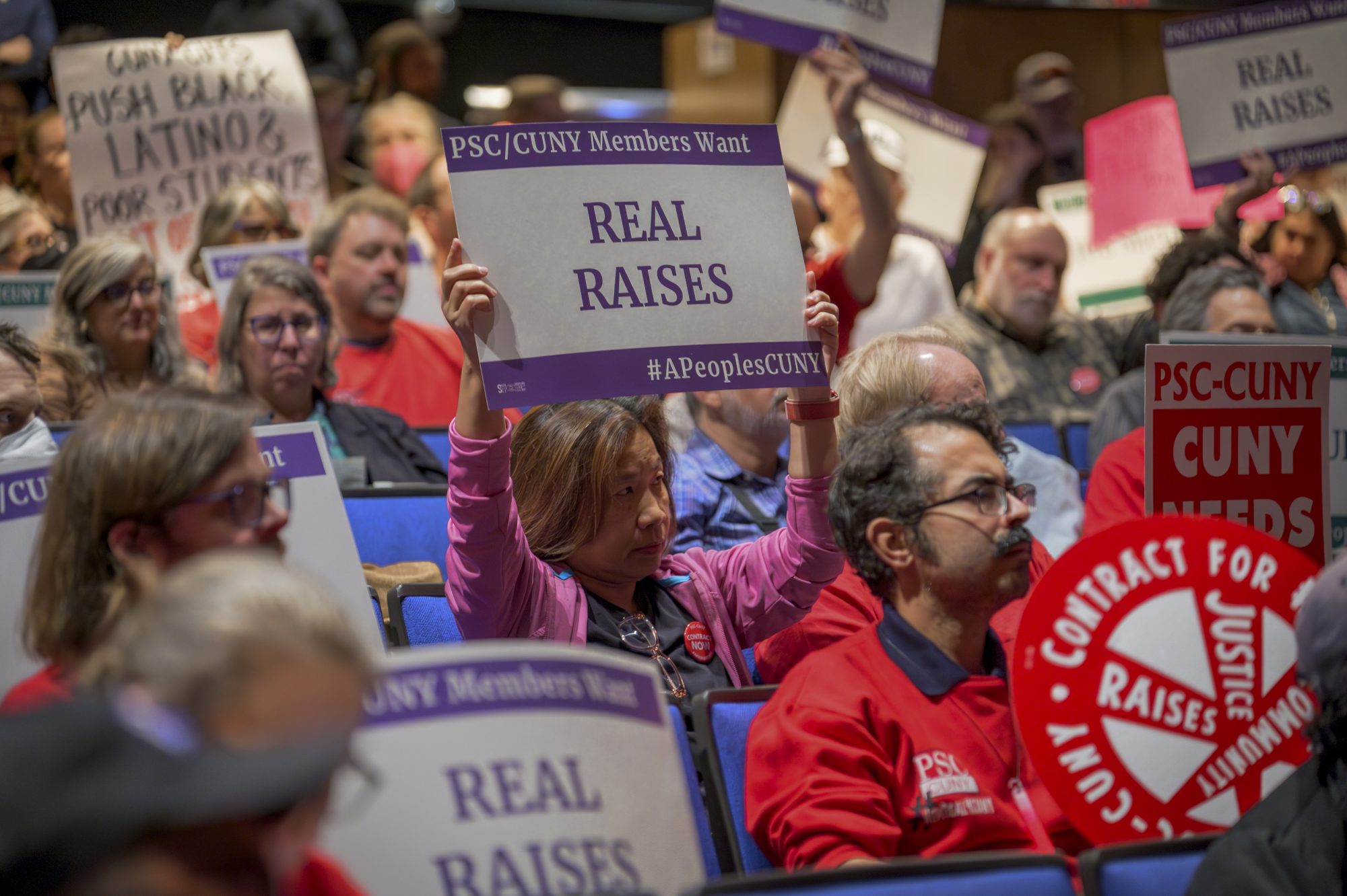 PSC members disrupt the CUNY Trustees hearing to demand management provide a fair economic offer (Photo by Erik McGregor)