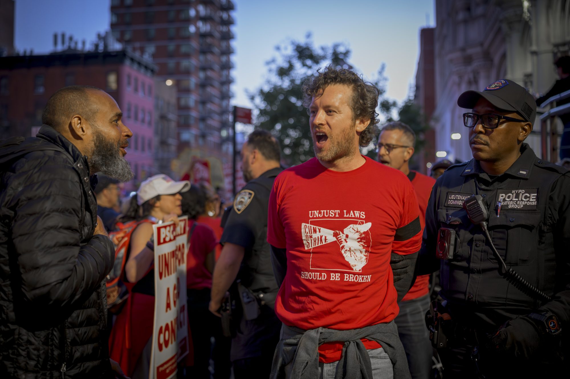 PSC Members are arrested while demanding a fair economic offer from CUNY Trustees (Photo by Erik McGregor)