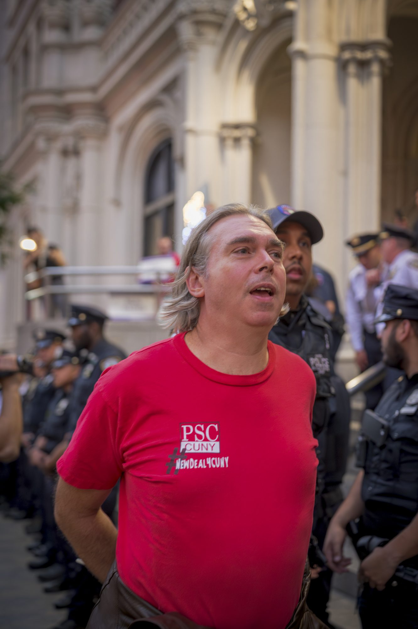 PSC Members are arrested while demanding a fair economic offer from CUNY Trustees (Photo by Erik McGregor)