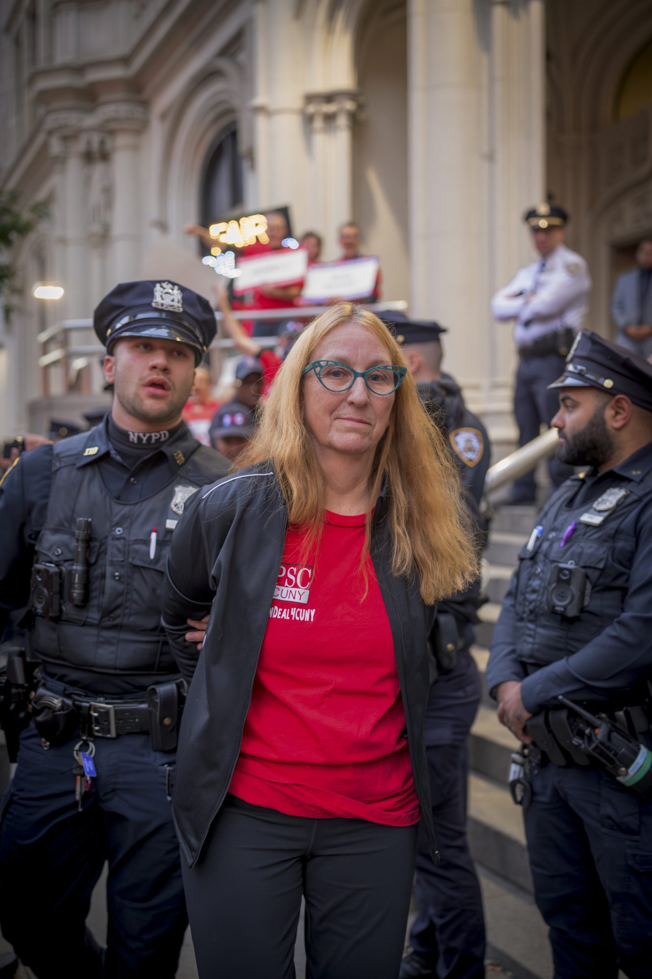 PSC Members are arrested while demanding a fair economic offer from CUNY Trustees (Photo by Erik McGregor)