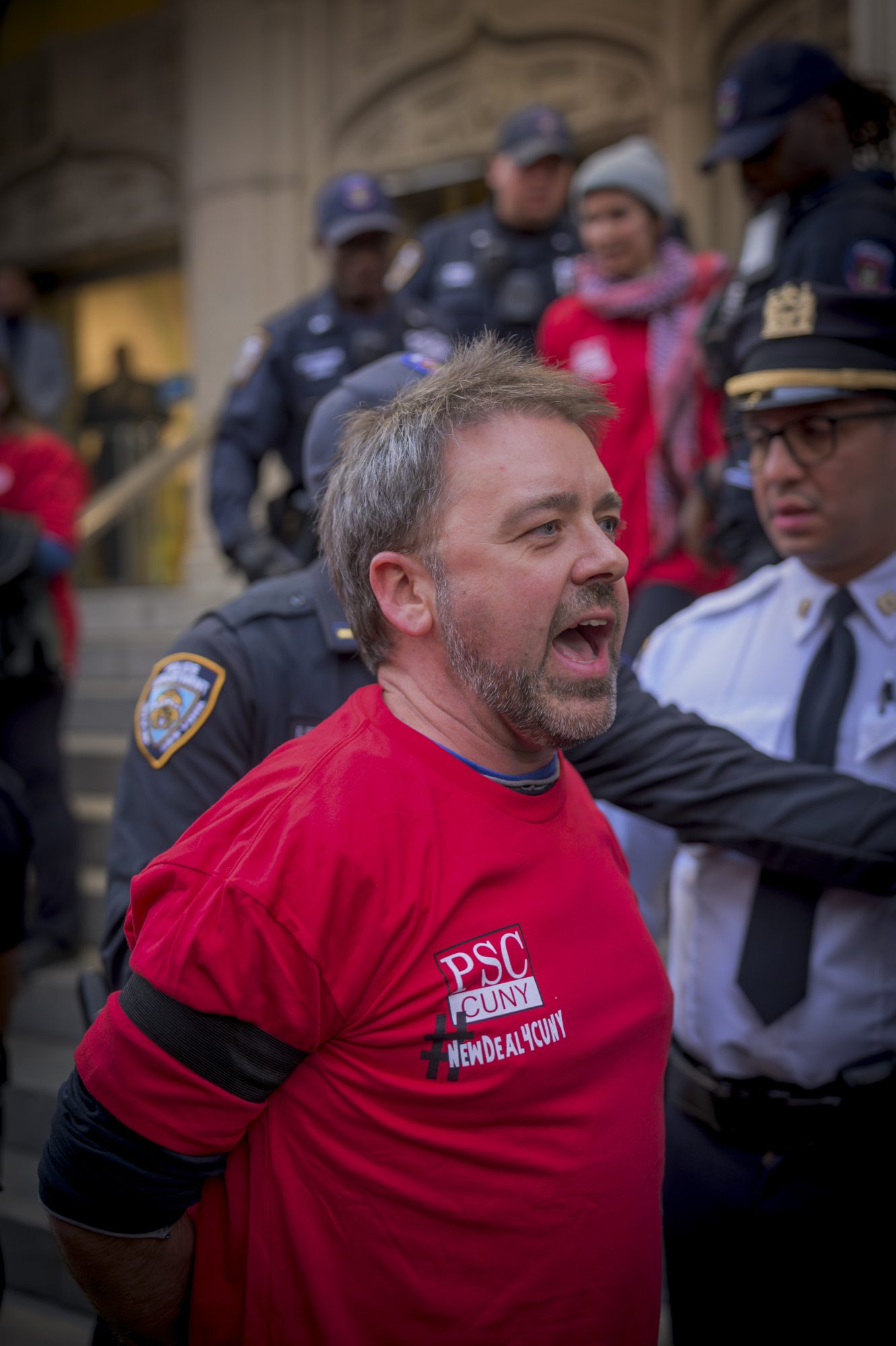 PSC Members are arrested while demanding a fair economic offer from CUNY Trustees (Photo by Erik McGregor)