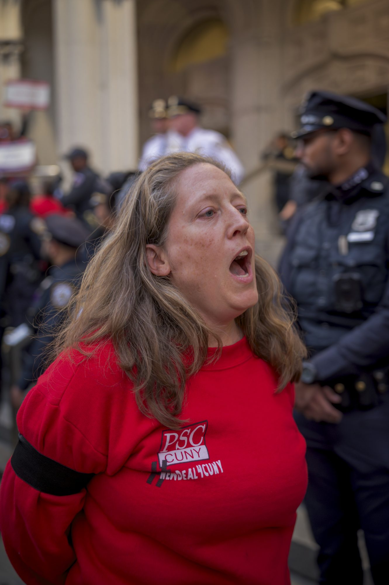 PSC Members are arrested while demanding a fair economic offer from CUNY Trustees (Photo by Erik McGregor)