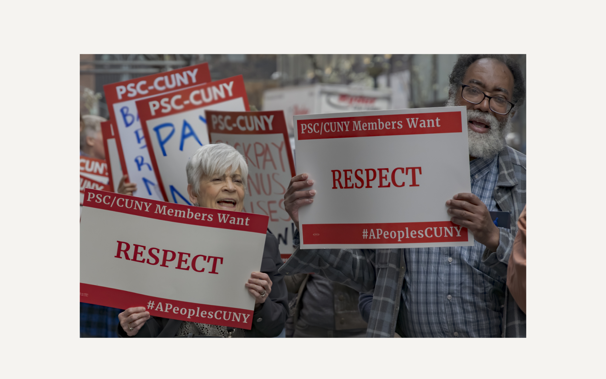 PSC members holding RESPECT signs by Erik McGregor